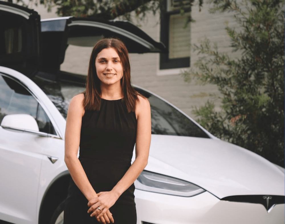 Evoke Pia with white Tesla