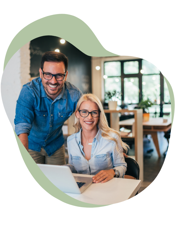 Male and female with laptop small business